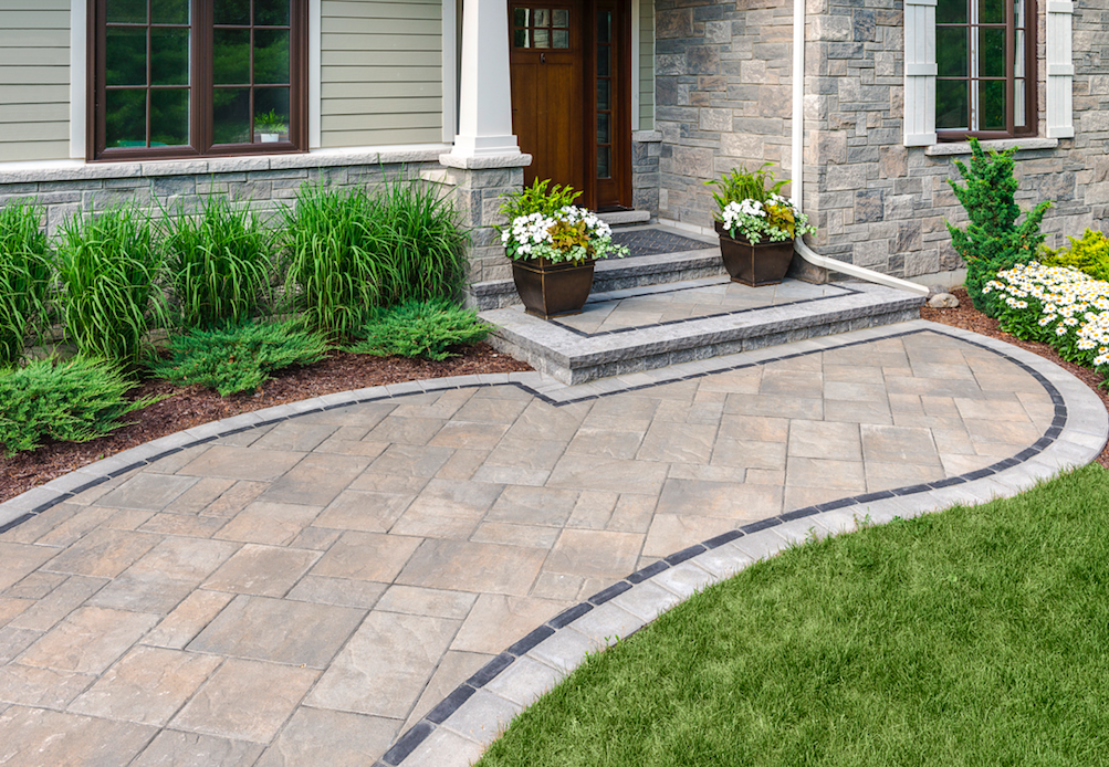 Premium paver walkway with stone facade