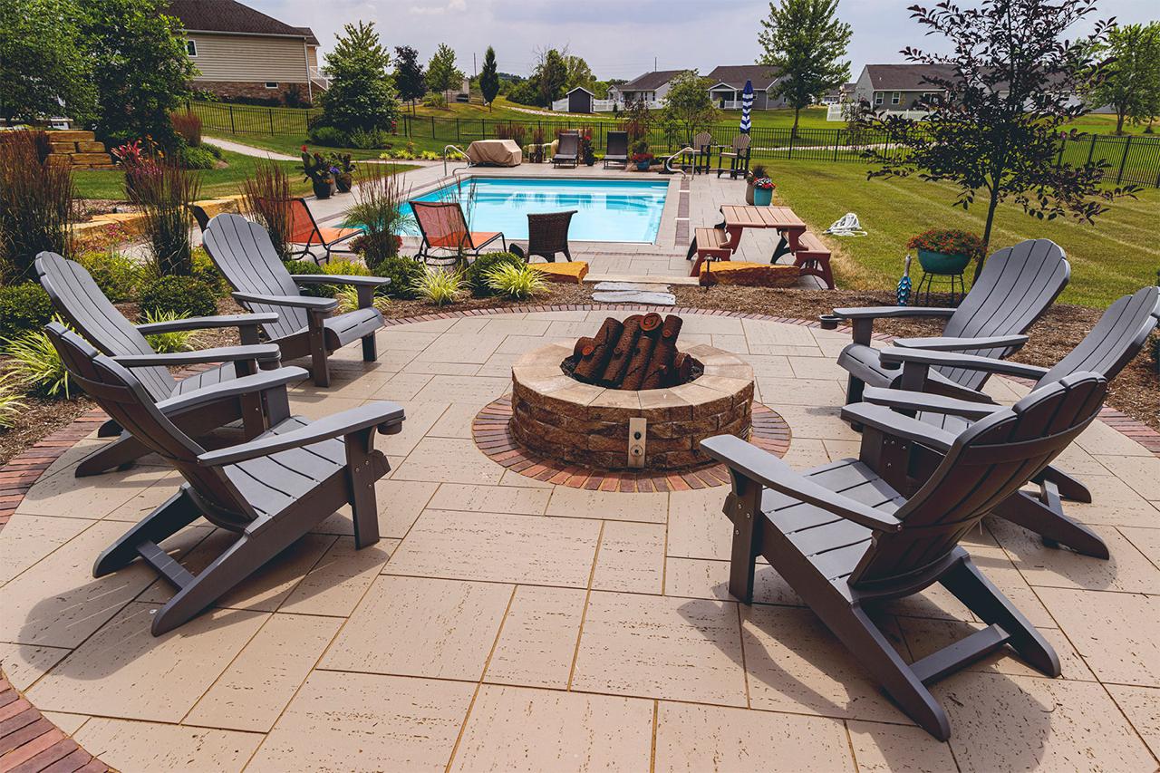 Paver patio with fire pit and pool